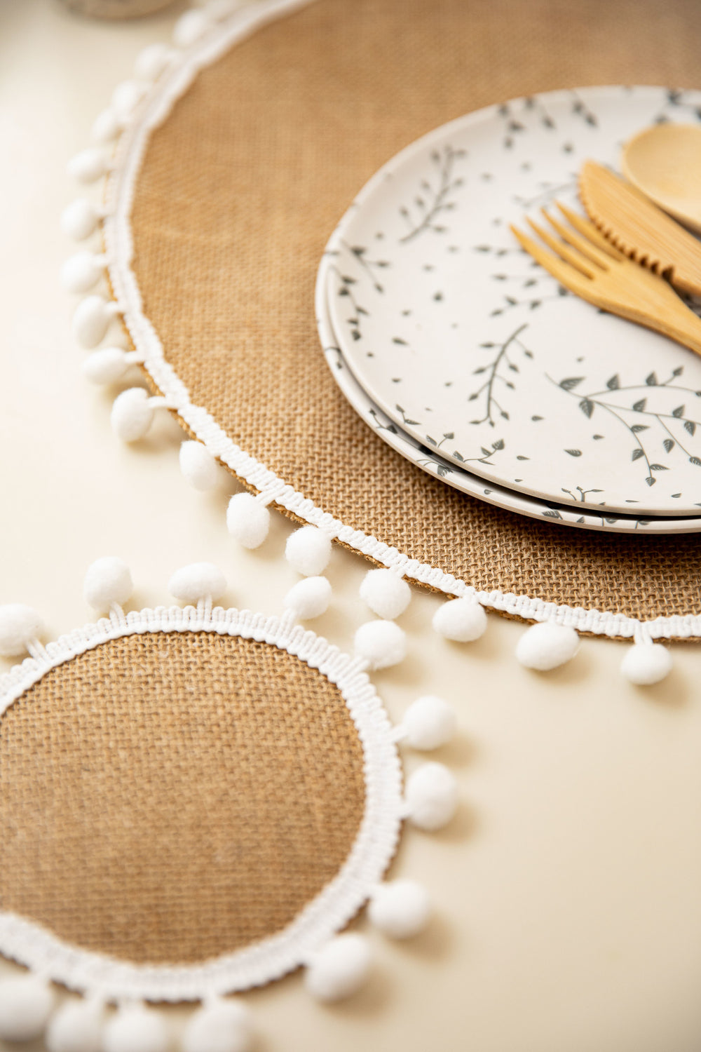 Natural Elements Set of 4 Woven Hessian Drink Coasters with Pom Pom Decorations