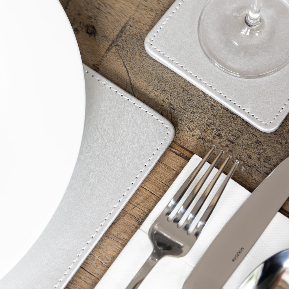 Creative Tops Naturals Premium Pack Of 4 Stitched Edge Faux Leather Placemats Metalic Silver