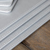 Creative Tops Naturals Premium Pack Of 4 Stitched Edge Faux Leather Placemats Metalic Silver