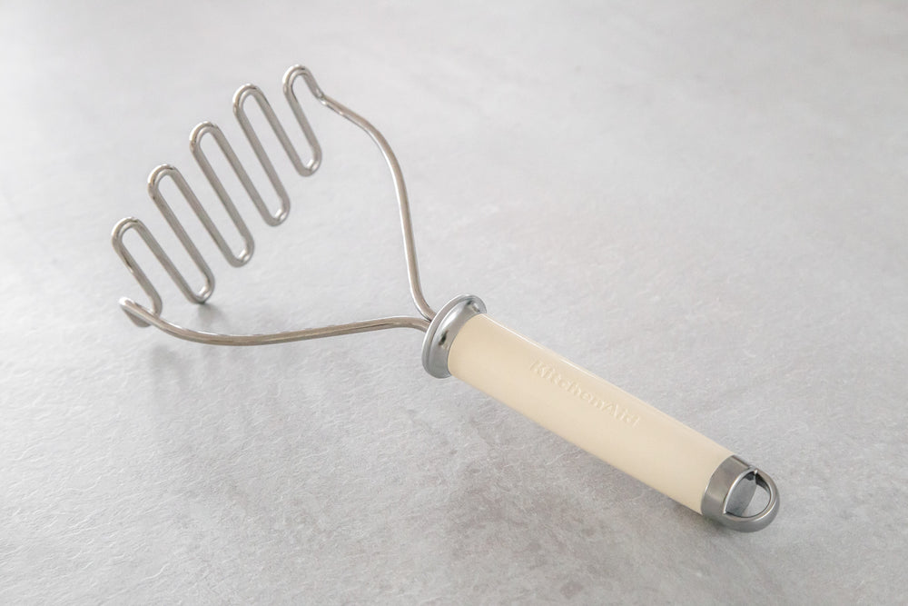 KitchenAid Stainless Steel Potato Masher – Almond Cream